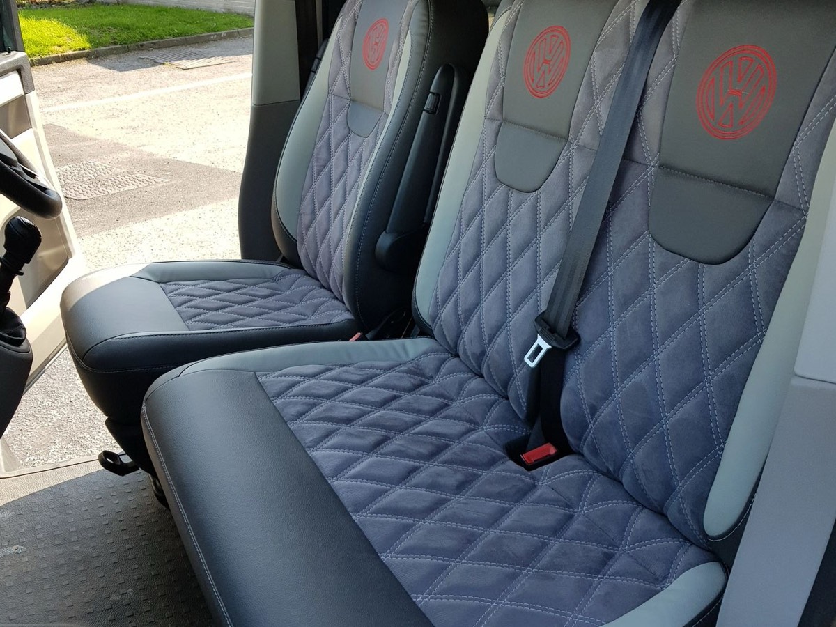 Quilted grey bench seat with seatbelts