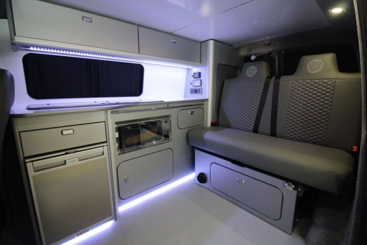 Grey T6 interior with kitchen units, LED lighting and a bench seat
